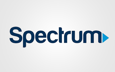 The spectrum logo on a white background showcasing senior living care.
