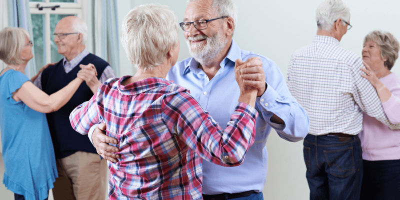 Three older adult couples dancing