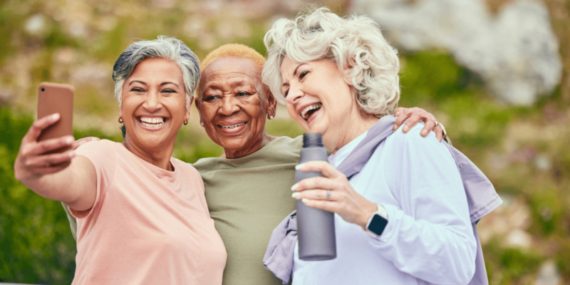 Three senior woman taking a selfie enjoying senior living communities.