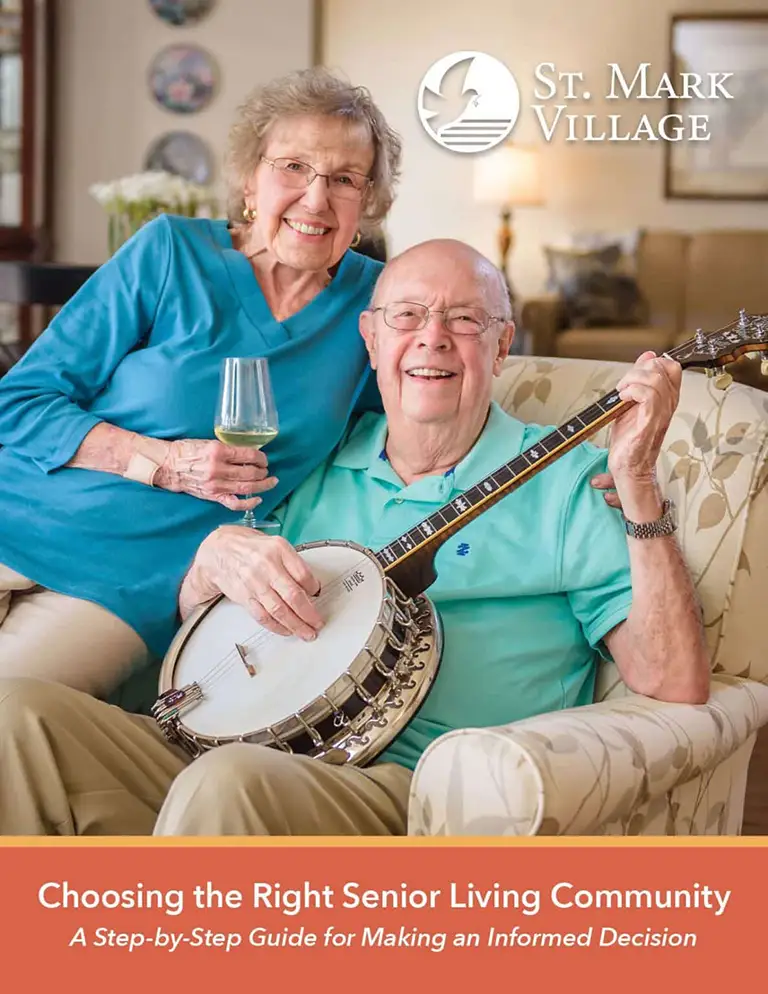 An elderly couple sits together on a couch; the man holds a banjo and the woman holds a wine glass. Text reads, "Choosing the Right Senior Living Community - St. Mark Village senior living.
