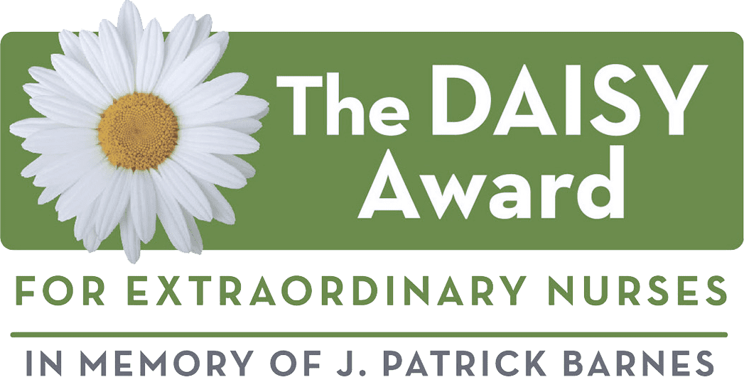A green banner with a white daisy graphic and text reading “The DAISY Award for Extraordinary Nurses In Memory of J. Patrick Barnes,” celebrating compassionate care at St. Mark Village senior living. A green banner with a white daisy graphic and text reading “The DAISY Award for Extraordinary Nurses In Memory of J. Patrick Barnes,” celebrating compassionate care at St. Mark Village senior living.