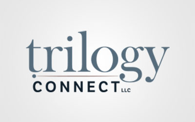 Logo for "trilogy CONNECT LLC" with "trilogy" in large, gray lowercase letters and "CONNECT LLC" below in smaller, black uppercase letters. Plain light gray background. Ideal for senior living communities like St. Mark Village.
